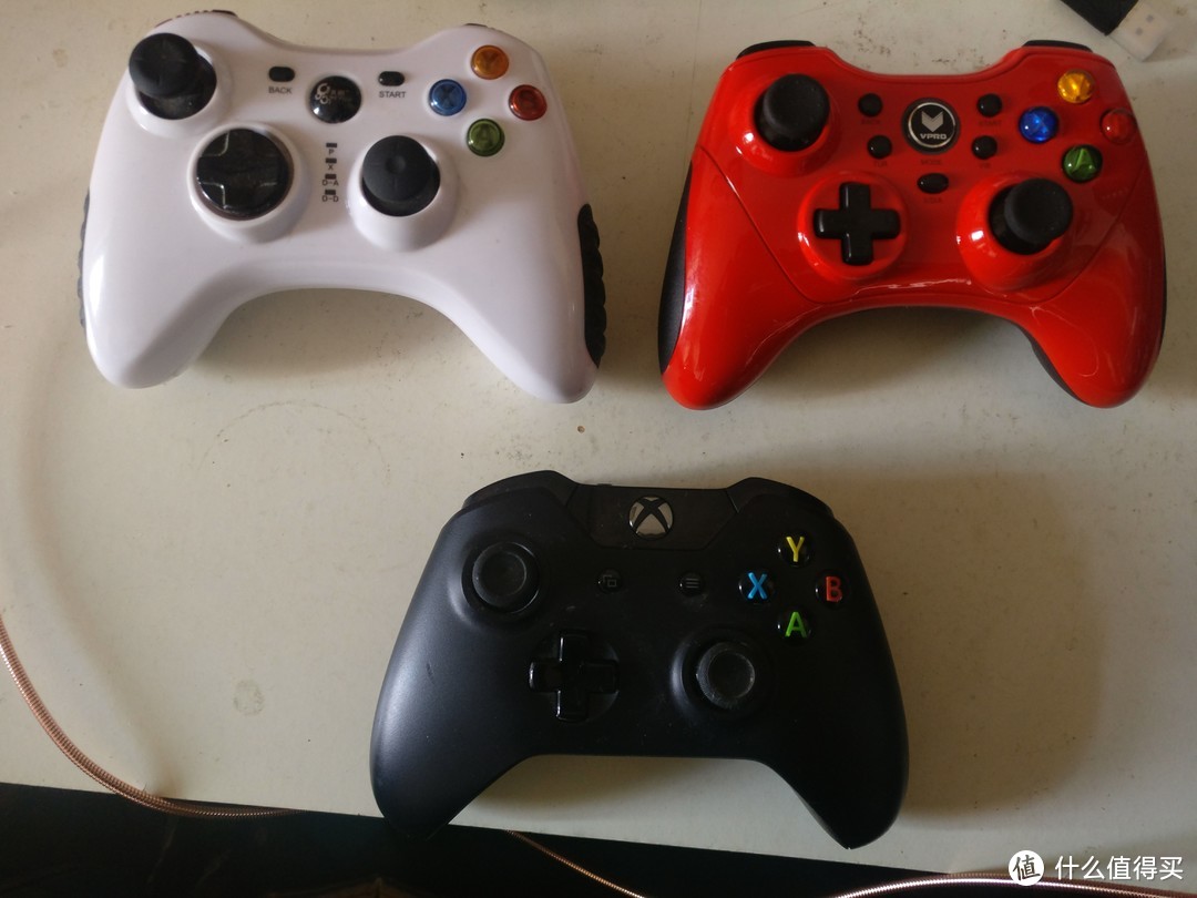 主玩的xbox360（one）北通阿修罗与雷柏v600s正面图