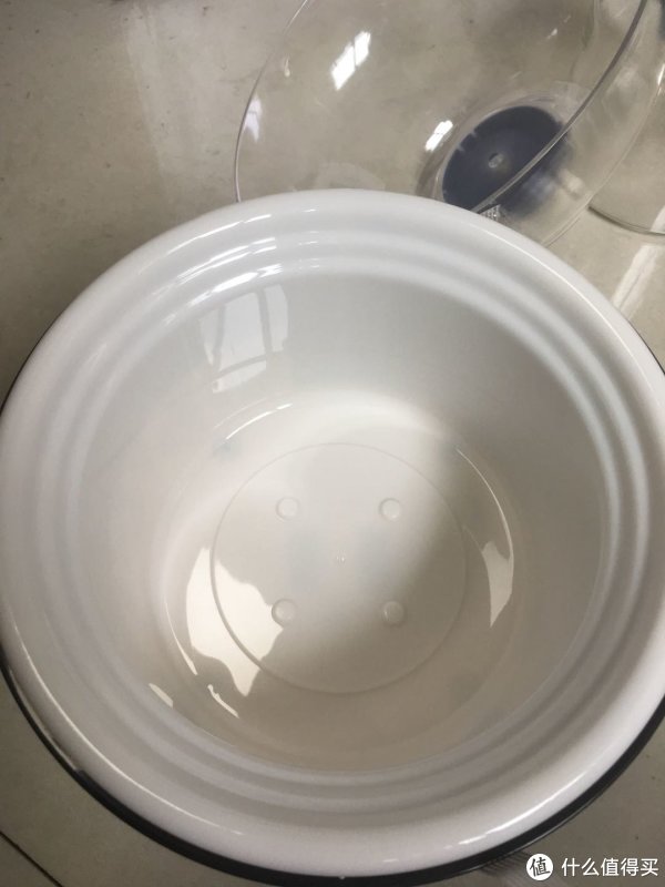 移除玻璃内胆后，主机的加热体，塑料的，提供不间断加热