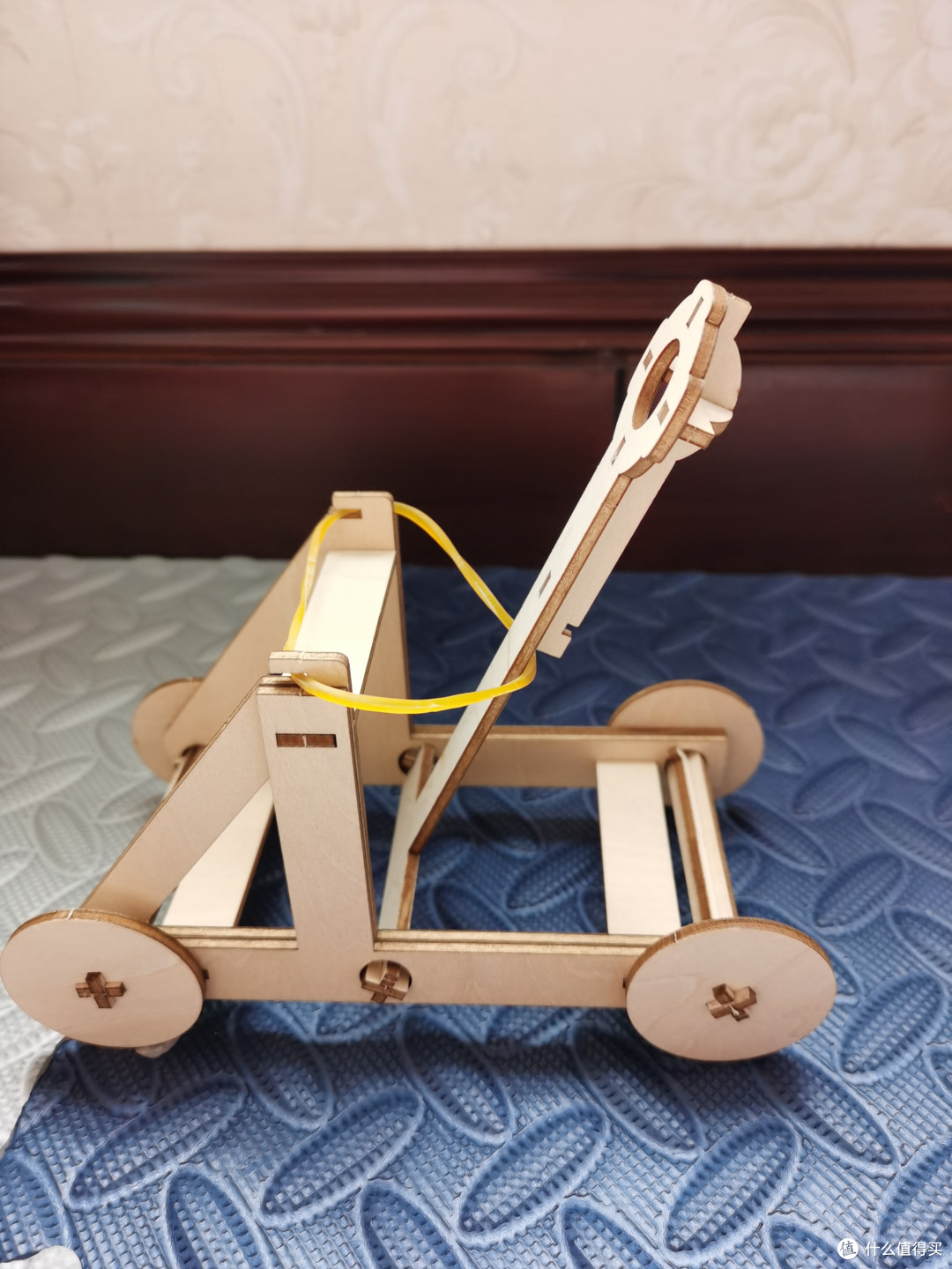 提问:这个投石机究竟是省力杠杆还是费力杠杆呢?