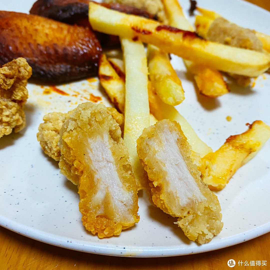 鸡米花外酥里嫩，除了外裹的面糊稍厚，口味很不错