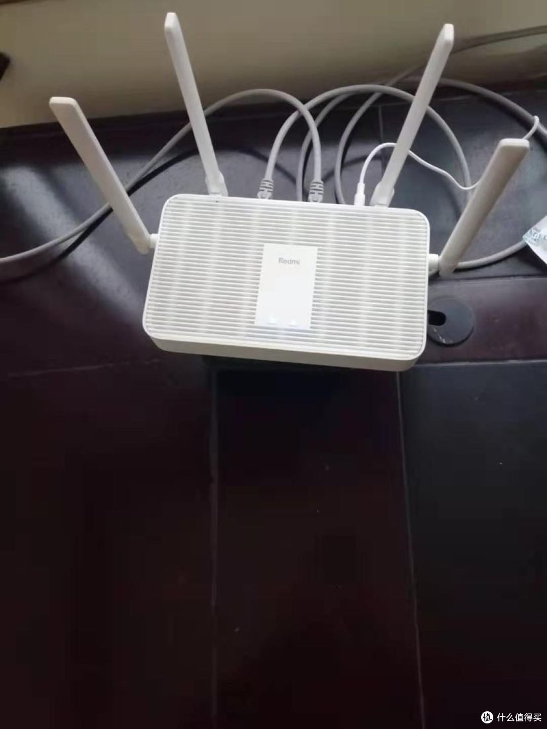 从中国移动的光猫接出一根网线到路由器的wan口,再由路由器的lan口分