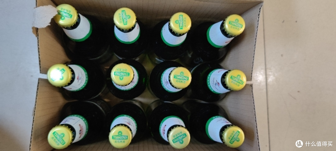 啤酒的话没有喝扎啤,喝的还是青岛啤酒二厂大绿棒子.