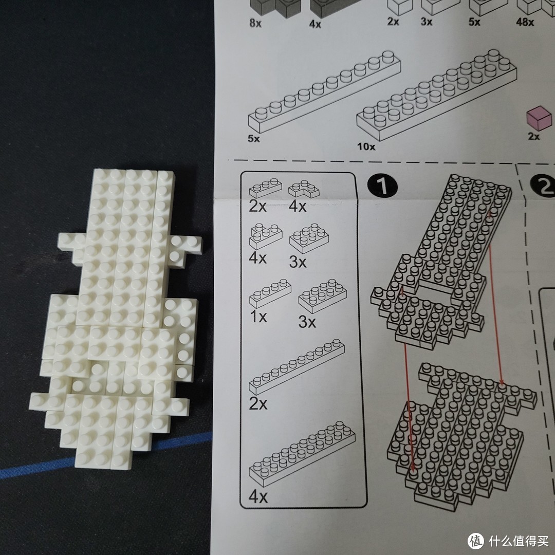 第一层拼装完成后，与图纸合影留念