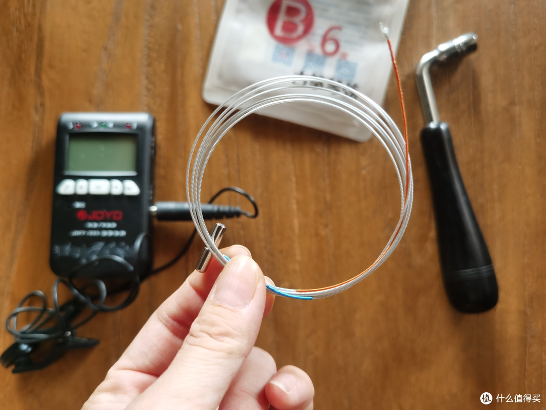 古筝的弦断了，自己换