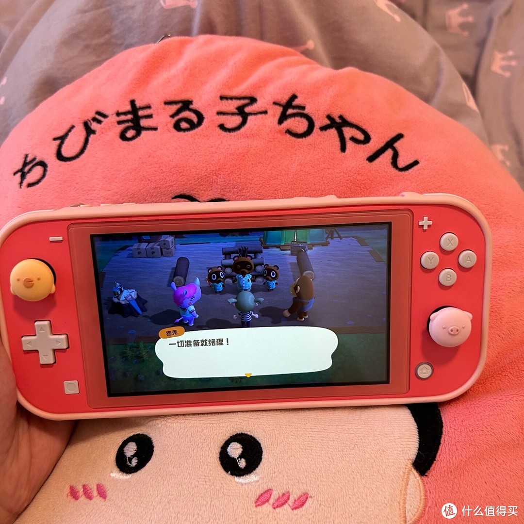 任天堂Switch Lite珊瑚粉：轻便携带,粉色少女心满满