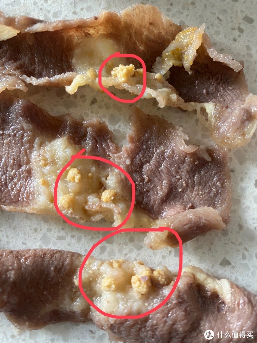 19.5一包买的恒都肥牛卷里煮熟有白色颗粒物